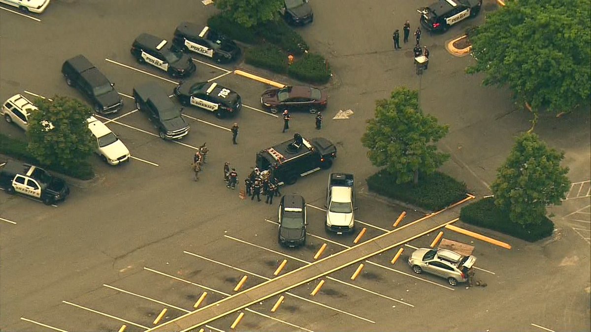 Scene of stand-off in Everett. Reports of a man shooting a gun inside an apartment complex.