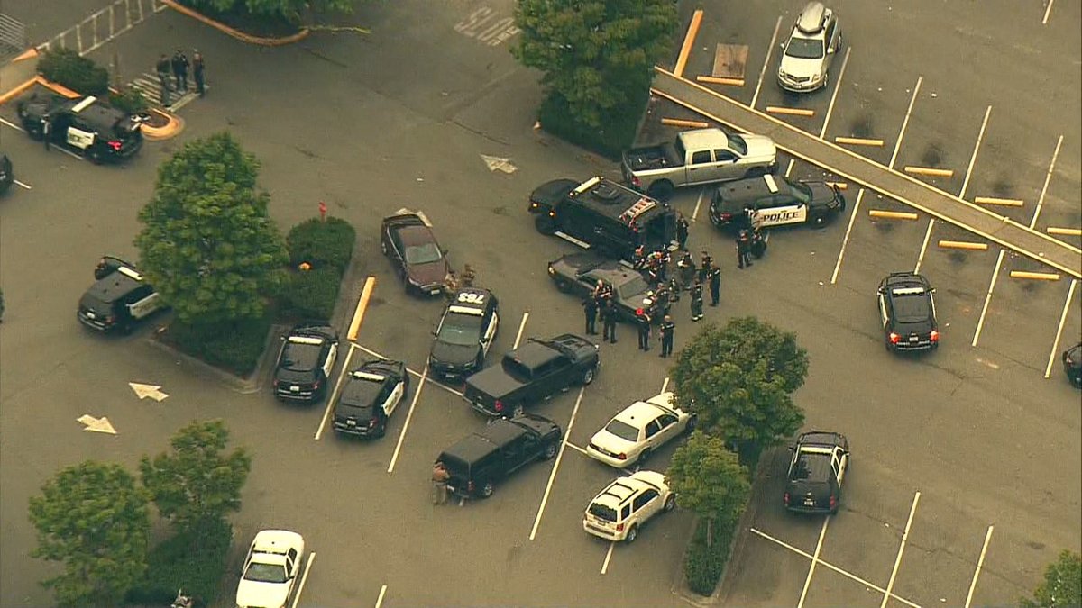 Scene of standoff in Everett. Reports of a man shooting a gun inside