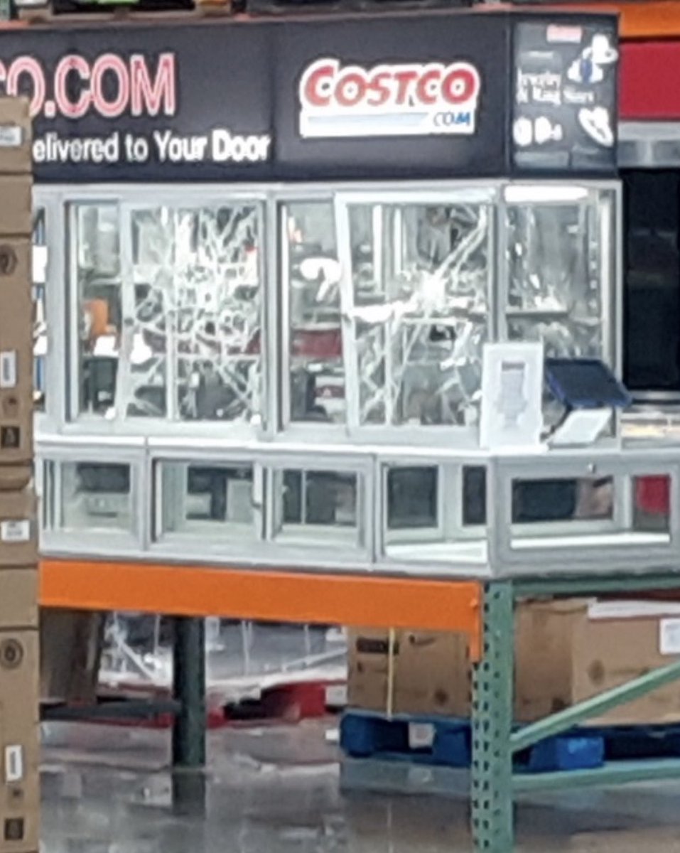 New pictures from inside the Issaquah Costco — Police say 3 people drove a stolen truck into the closed store this AM (as employees worked) then started shooting, hitting this jewelry case. No one hurt, some stuff stolen