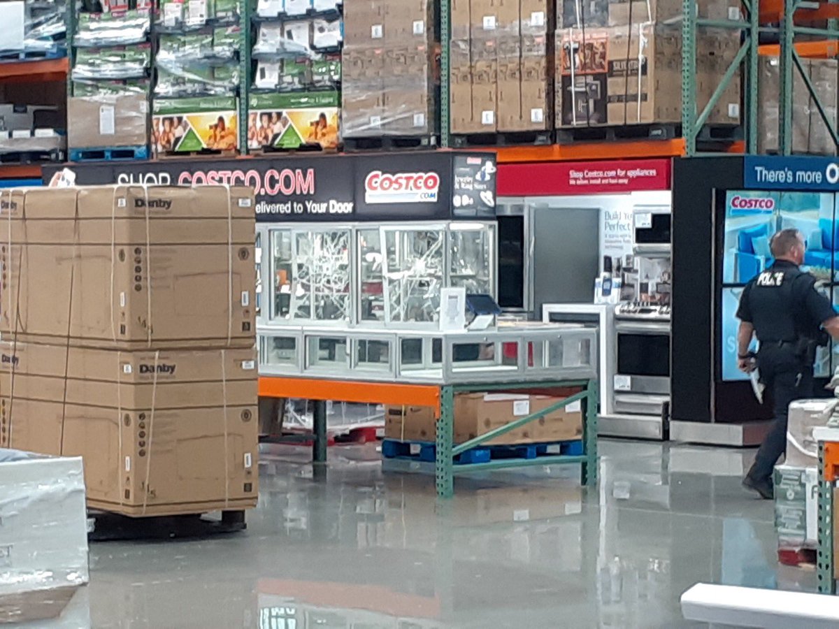 New pictures from inside the Issaquah Costco — Police say 3 people drove a stolen truck into the closed store this AM (as employees worked) then started shooting, hitting this jewelry case. No one hurt, some stuff stolen