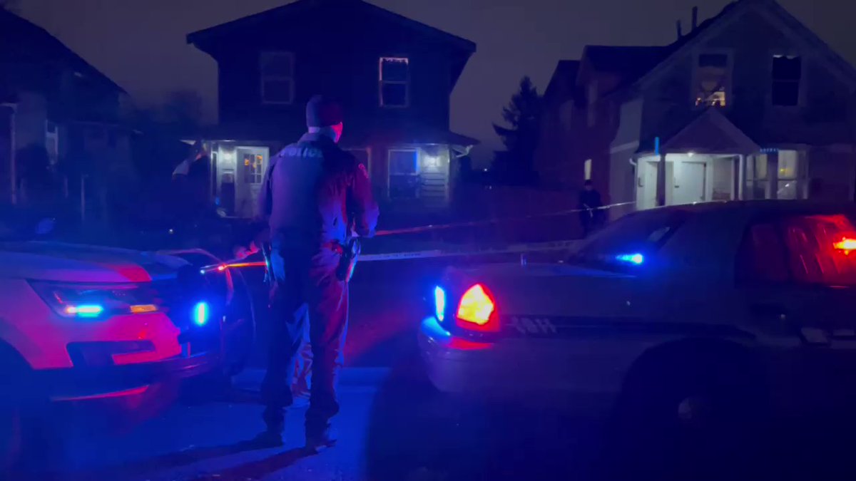 Tacoma Police officers set up crime scene tape around a home on the 800 block of South Sheridan Avenue where a man had been shot earlier in the evening. The man who was shot was transported to a hospital where he died from the shooting