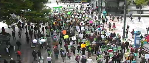 Demonstration headed WB on Pine St at 5th Ave blocking all lanes. Use caution