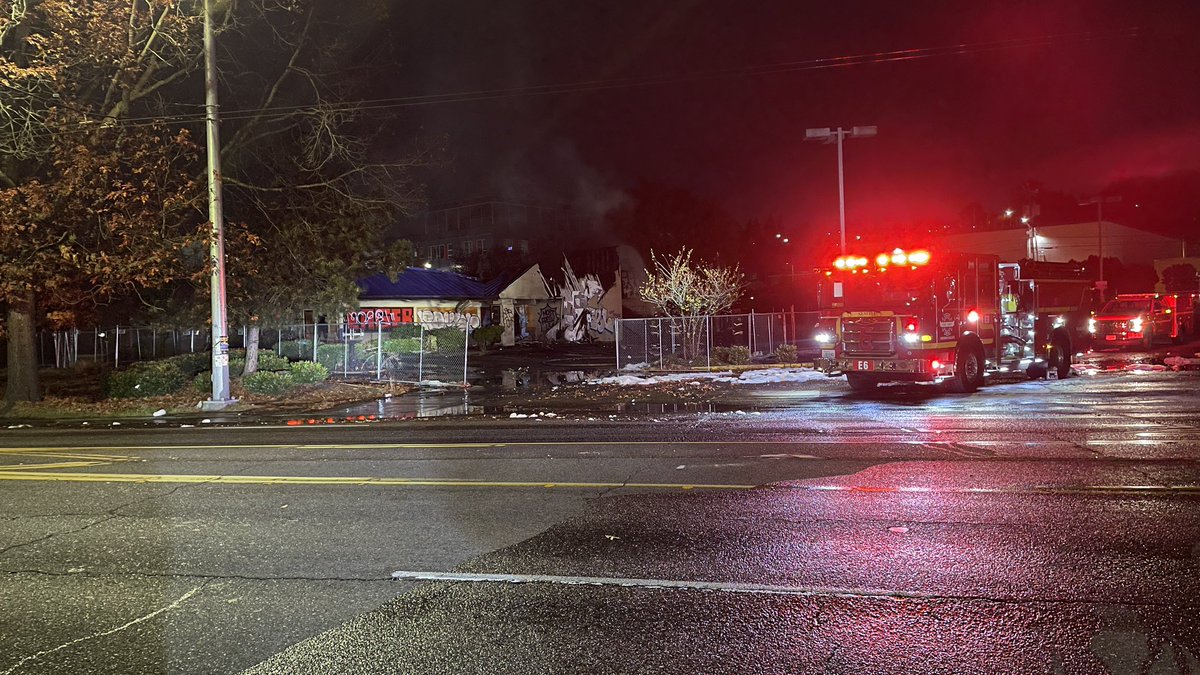 Seattle Fire crews are spraying hotspots at an old, vacant Burger King in the 2000 block of Rainier Ave S. They say the roof collapsed. No one hurt. Cause of the fire unknown. The building appears to be boarded up and covered in graffiti.