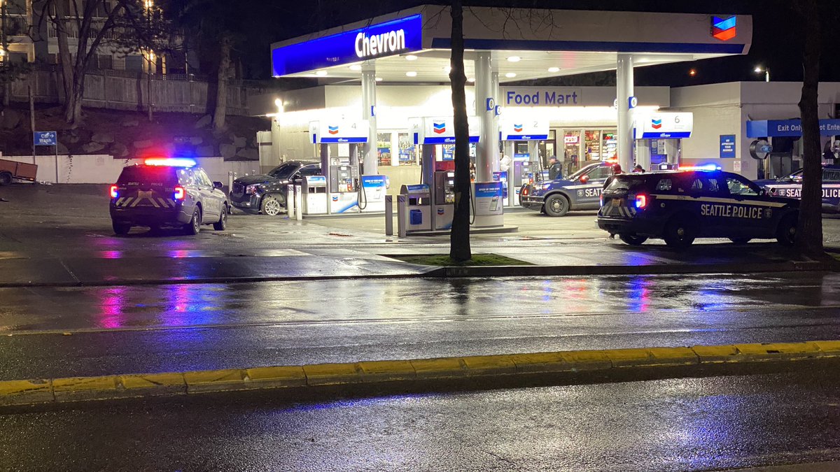 Seattle police are investigating a shooting in the 2100 block of N. Northgate Way with a big presence at a Chevron gas station parking lot.  