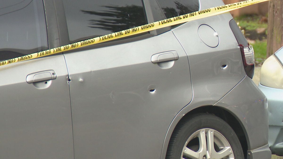 A 20-year-old woman was injured in an 'unprovoked' shooting in the University District. Bullets went into several nearby cars as well