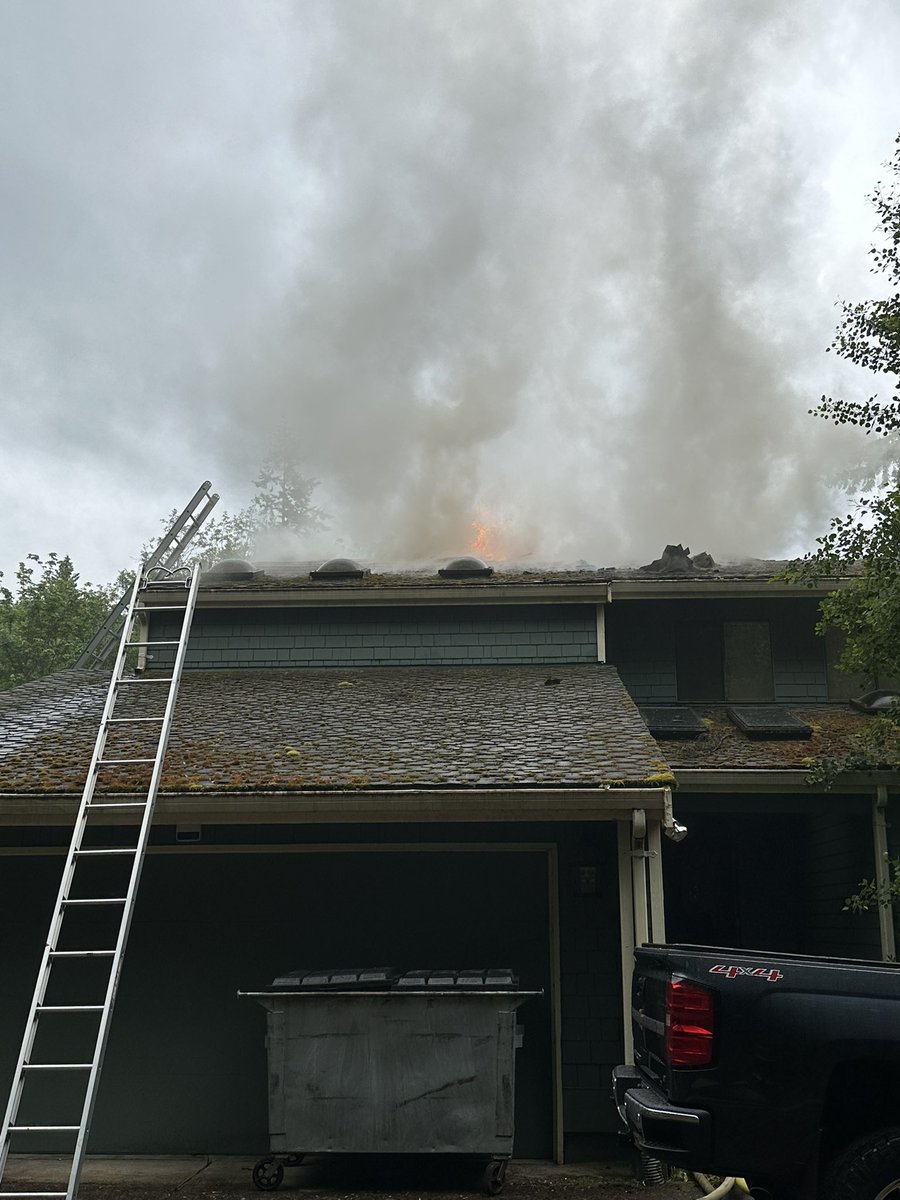 Building fire in the 13800 block of SE 208th Street. Firefighters arrived and had flames through a portion of the roof. No injuries were reported