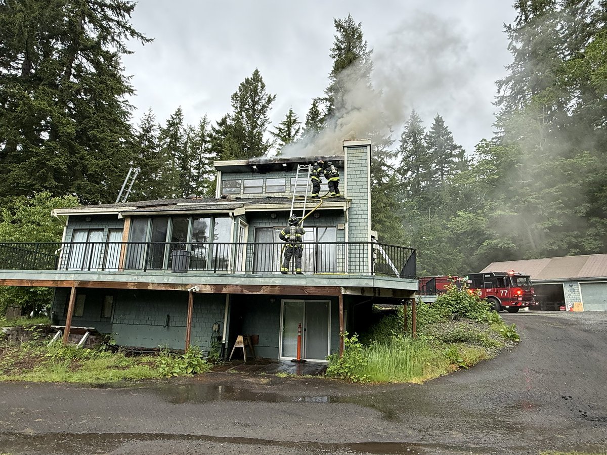 Building fire in the 13800 block of SE 208th Street. Firefighters arrived and had flames through a portion of the roof. No injuries were reported