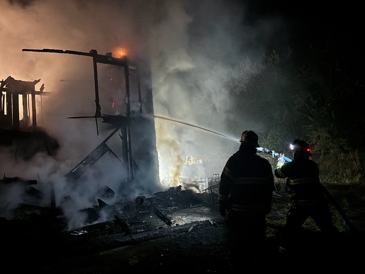 Crews were dispatched to a residential structure fire in the 22500 block of 147th Ave Ct E in Graham. Upon arrival, firefighters found heavy fire conditions with flames visible through the roof. Due to the extent of the fire, crews initiated a defensive fire attack