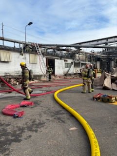 800 blk E 26th St TFD responded to calls for a fire at a commercial structure. Crews saw smoke plume from across I-5 prior to arrival. On scene, firefighters quickly subdued the interior fire, then focused on roof fire. Fire is under control. 
